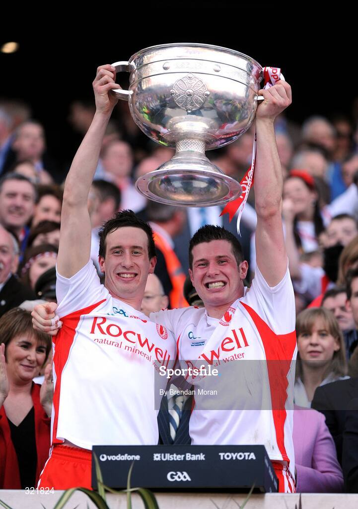 21 September 2008; Tyrone players Colm, left, and Sean Cavanagh lift the Sam Maguire Cup after victory over Kerry. GAA Football All-Ireland Senior Championship Final, Kerry v Tyrone, Croke Park, Dublin. Picture credit: Brendan Moran / SPORTSFILE