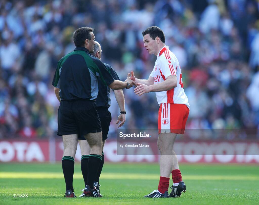 21 September 2008; Conor Gormley, Tyrone, shakes hands with referee Maurice Deegan at half-time. GAA Football All-Ireland Senior Championship Final, Kerry v Tyrone, Croke Park, Dublin. Picture credit: Brendan Moran / SPORTSFILE
