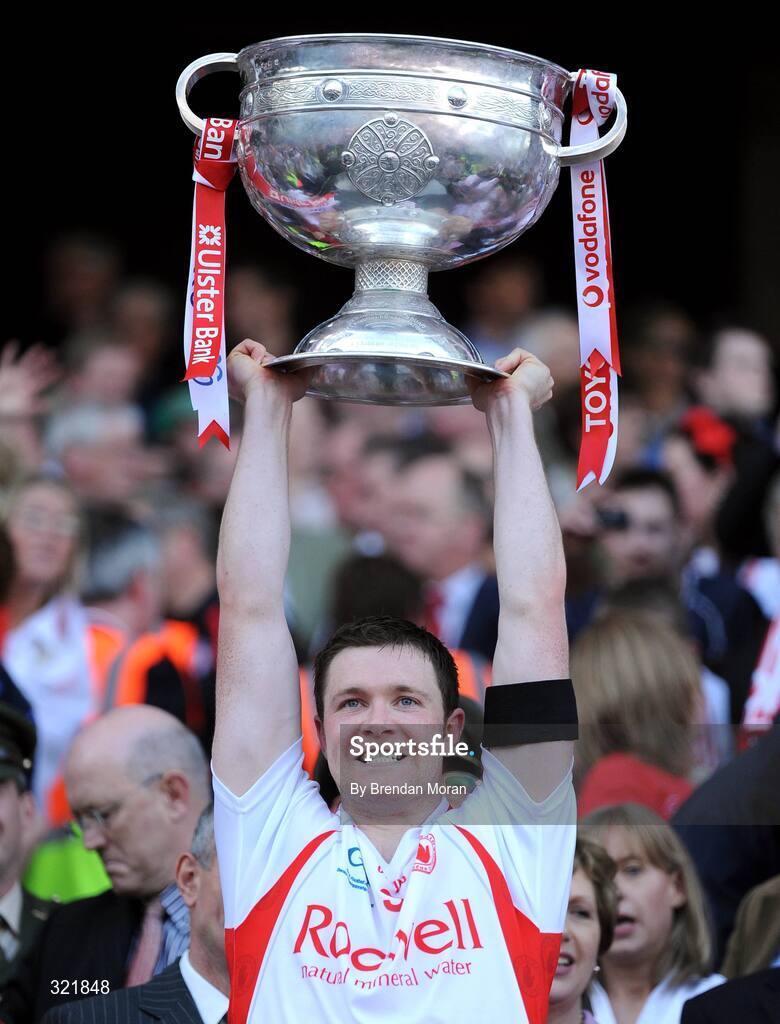21 September 2008; Tyrone's Enda McGinley lifts the Sam Maguire Cup after victory over Kerry. GAA Football All-Ireland Senior Championship Final, Kerry v Tyrone, Croke Park, Dublin. Picture credit: Brendan Moran / SPORTSFILE