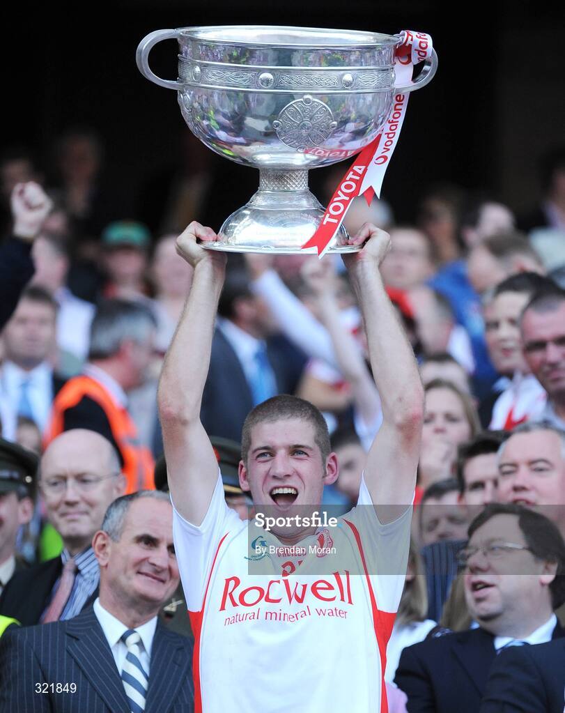 21 September 2008; Tyrone's Kevin Hughes lifts the Sam Maguire Cup after victory over Kerry. GAA Football All-Ireland Senior Championship Final, Kerry v Tyrone, Croke Park, Dublin. Picture credit: Brendan Moran / SPORTSFILE
