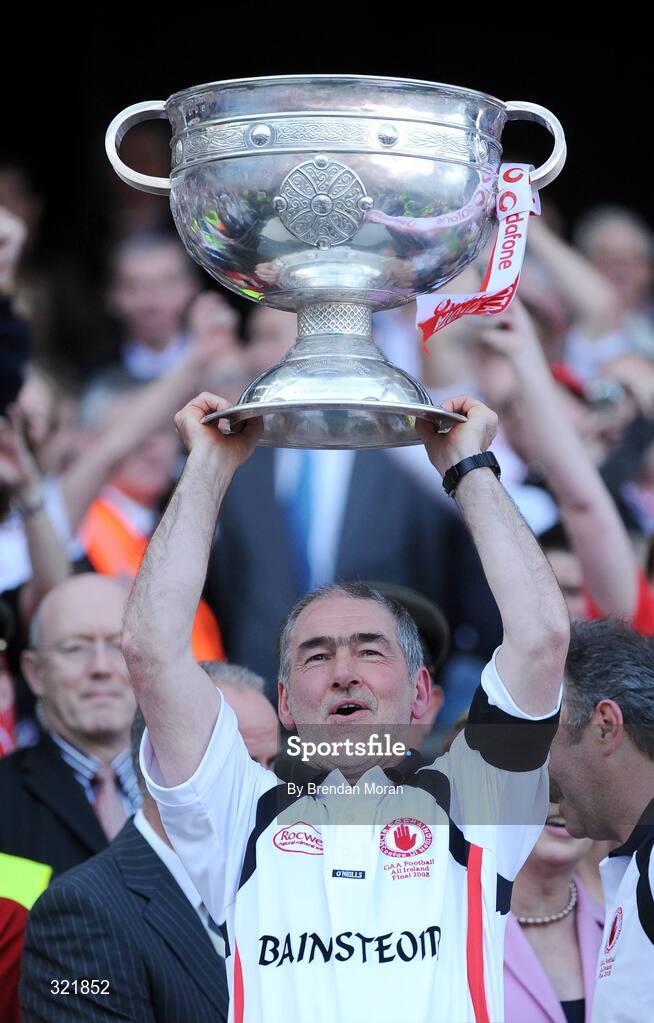 21 September 2008; Tyrone manager Mickey Harte lifts the Sam Maguire Cup after victory over Kerry. GAA Football All-Ireland Senior Championship Final, Kerry v Tyrone, Croke Park, Dublin. Picture credit: Brendan Moran / SPORTSFILE