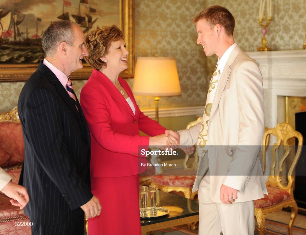 20 September 2008; Olympic rower Richard Archibald is greeted by President Mary McAleese and Dr. Martin McAleese during a reception for the Irish athletes, coaches and officials who represented Ireland at the Beijing Olympics, hosted by President Mary McAleese at Aras an Uachtaran. Irish Olympians visit Aras an Uachtarain, Phoenix Park, Dublin. Picture credit: Brendan Moran / SPORTSFILE