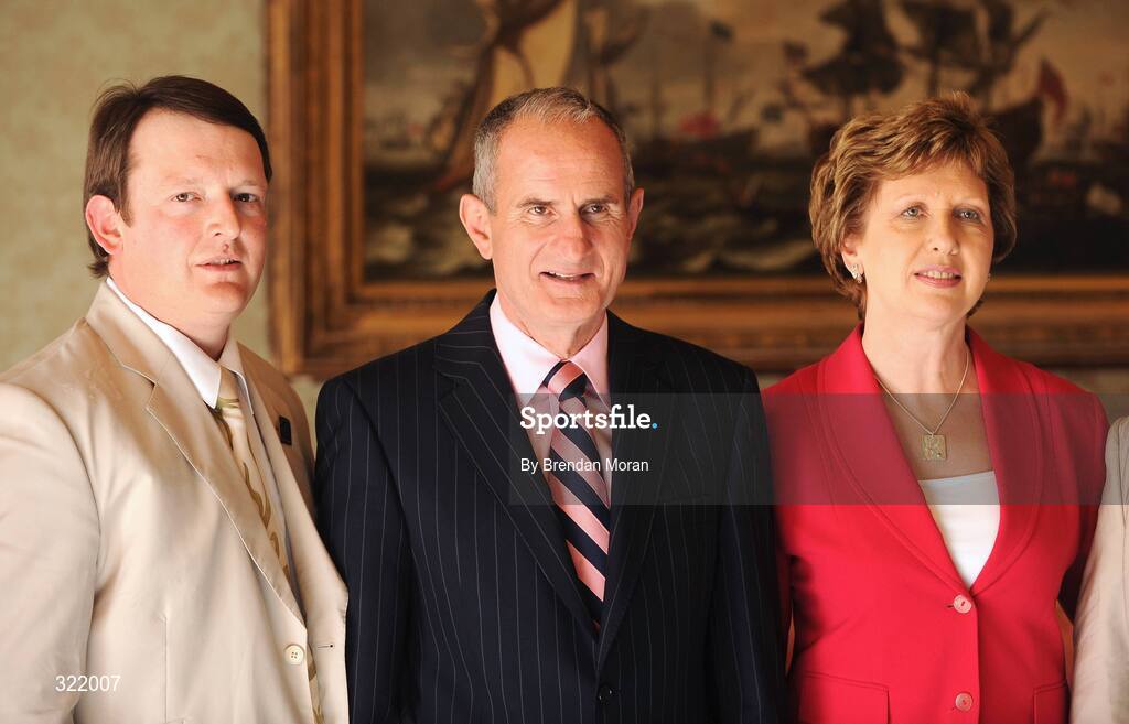 20 September 2008; Olympic trap shooter Derek Burnett with President Mary McAleese and Dr. Martin McAleese during a reception for the Irish athletes, coaches and officials who represented Ireland at the Beijing Olympics, hosted by President Mary McAleese at Aras an Uachtaran. Irish Olympians visit Aras an Uachtarain, Phoenix Park, Dublin. Picture credit: Brendan Moran / SPORTSFILE