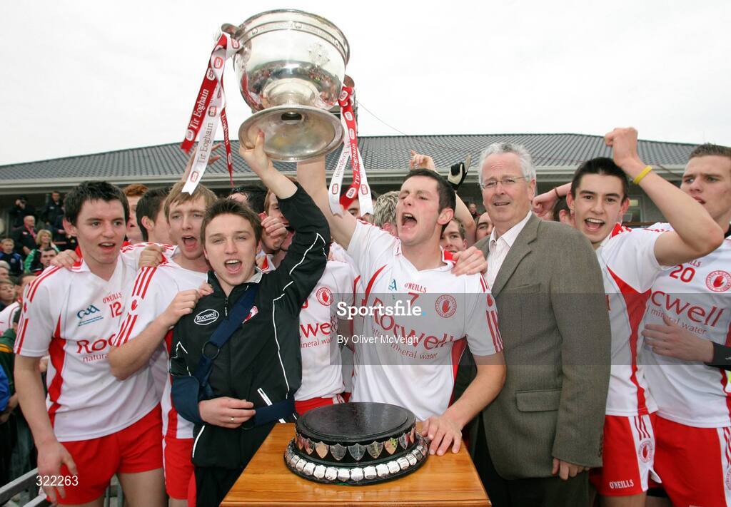27 September 2008; Tyrone Captain Ronan McNabb, assisted by team captain Ryan Pickering, injured, lift the Tom Markham cup in the company of John Redmond, Head of Corporate affairs, ESB. ESB GAA Football All-Ireland Minor Championship Final Replay, Tyrone v Mayo, Pearse Park, Longford. Picture credit: Oliver McVeigh / SPORTSFILE