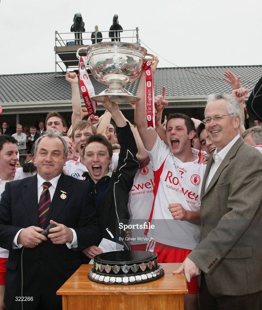 27 September 2008; Tyrone Captain Ronan McNabb, assisted by team captain Ryan Pickering, injured, lift the Tom Markham cup in the company of GAA President Nickey Brennan, left, and John Redmond, Head of Corporate affairs, ESB. ESB GAA Football All-Ireland Minor Championship Final Replay, Tyrone v Mayo, Pearse Park, Longford. Picture credit: Oliver McVeigh / SPORTSFILE