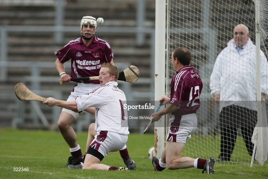 28 September 2008; Frances McAuley, Cushendalls Ruairi Og's, saves a penalty by Liam Watson, Loughgiel Shamrocks, assisted by Aaron Graffin and Aidan Delargy.  Antrim County Senior Hurling Final, Cushendalls Ruairi Og's v Loughgiel Shamrocks, Casement Park, Belfast, Co. Antrim. Picture credit: Oliver McVeigh / SPORTSFILE