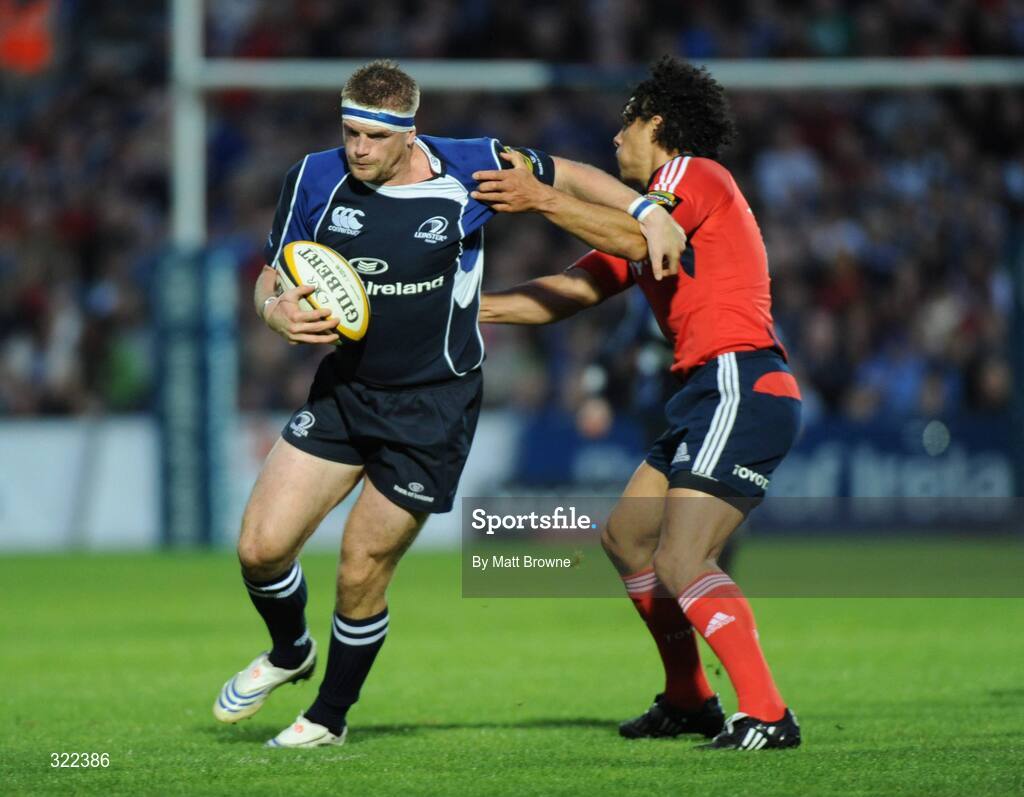 28 September 2008; Jamie Heaslip, Leinster, is tackled by Doug Howlett, Munster. Magners League, Leinster v Munster, RDS, Dublin. Picture credit: Matt Browne / SPORTSFILE