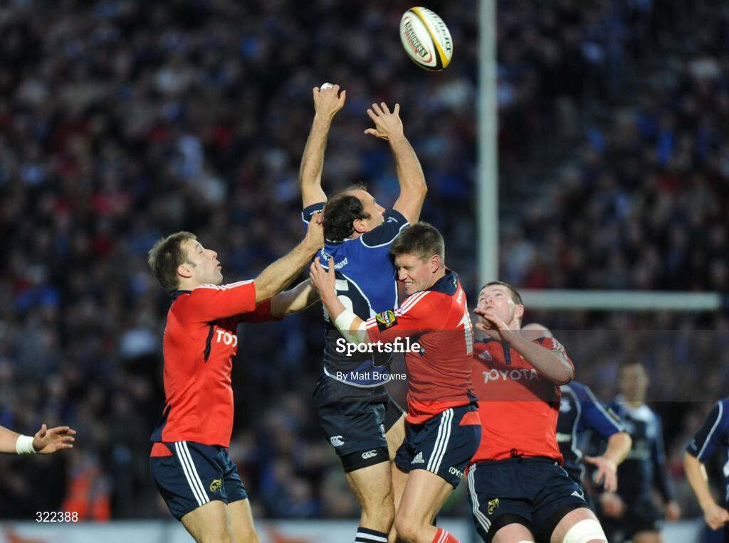 28 September 2008; Girvan Dempsey, Leinster, is tackled by Tomas O'Leary, Ronan O'Gara and Donnacha Ryan, Munster. Magners League, Leinster v Munster, RDS, Dublin. Picture credit: Matt Browne / SPORTSFILE