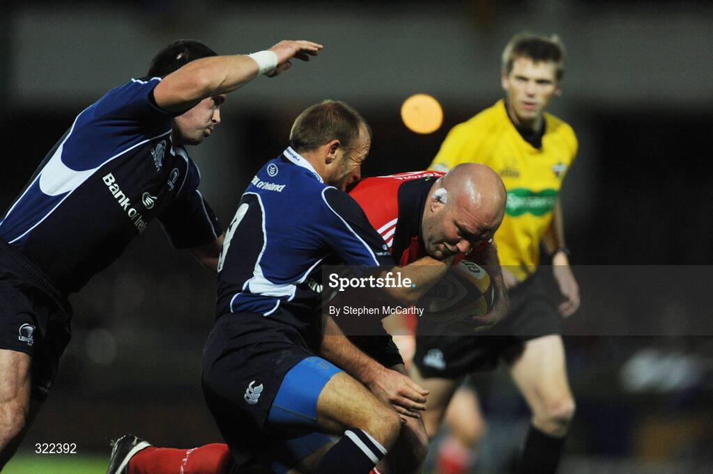 28 September 2008; John Hayes, Munster, is tackled by Chris Whitaker, left, and Shane Jennings, Leinster. Magners League, Leinster v Munster, RDS, Dublin. Picture credit: Stephen McCarthy / SPORTSFILE