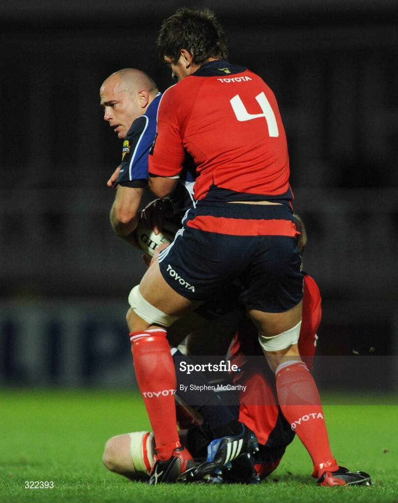 28 September 2008; Felipe Contepomi, Leinster, is tackled by Donncha O'Callaghan, 4, and Paul O'Connell, Munster. Magners League, Leinster v Munster, RDS, Dublin. Picture credit: Stephen McCarthy / SPORTSFILE