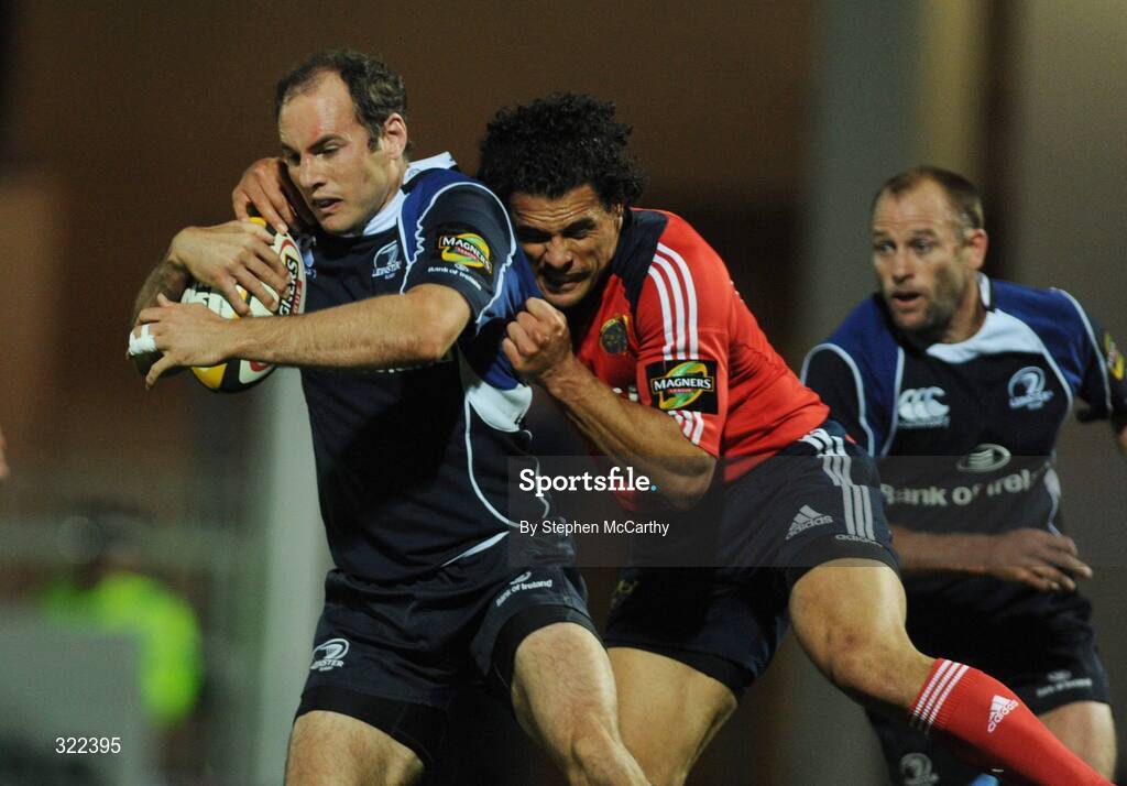 28 September 2008; Girvan Dempsey, Leinster, is tackled by Doug Howlett, Munster. Magners League, Leinster v Munster, RDS, Dublin. Picture credit: Stephen McCarthy / SPORTSFILE