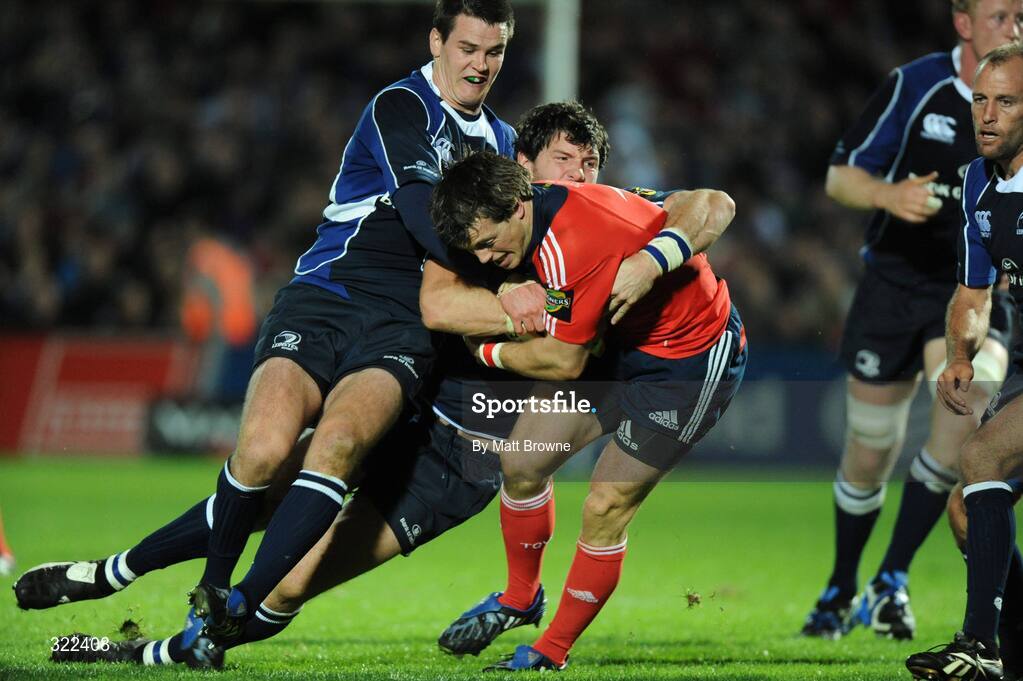 28 September 2008; Ian Dowling, Munster, is tackled by Shane Horgan and Jonathan Sexton, Leinster. Magners League, Leinster v Munster, RDS, Dublin. Picture credit: Matt Browne / SPORTSFILE