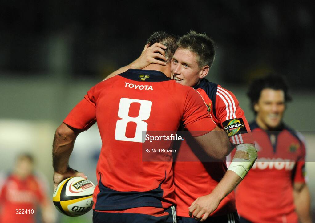 28 September 2008; Ronan O'Gara, Munster, congratulates try scorer Justin Melck after his try against Leinster. Magners League, Leinster v Munster, RDS, Dublin. Picture credit: Matt Browne / SPORTSFILE