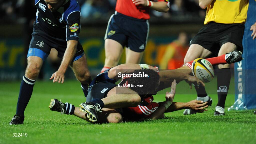 28 September 2008; Doug Howlett, Munster, after scoring the second try against Leinster despite the tackle of Shane Jennings. Magners League, Leinster v Munster, RDS, Dublin. Picture credit: Matt Browne / SPORTSFILE