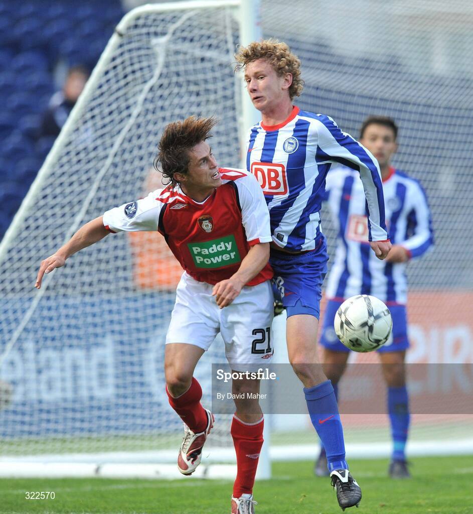 30 September 2008; The ball appears to come off the hand of Fabian Lustenberger, Hertha Berlin, as he challenges Ryan Guy, St Patrick's Athletic, during the closing stages of the first half. UEFA Cup First Round 2nd leg, St Patrick's Athletic v Hertha Berlin, RDS, Dublin. Picture credit: David Maher / SPORTSFILE