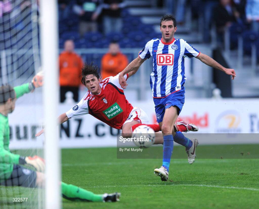 30 September 2008; Ryan Guy, St. Patrick's Athletic, challenged by Hertha Berlin's Maximilian Nicu watches as his shot is saved by Jaroslav Drobny. UEFA Cup First Round 2nd leg, St. Patrick's Athletic v Hertha Berlin, RDS, Dublin. Picture credit: Pat Murphy / SPORTSFILE