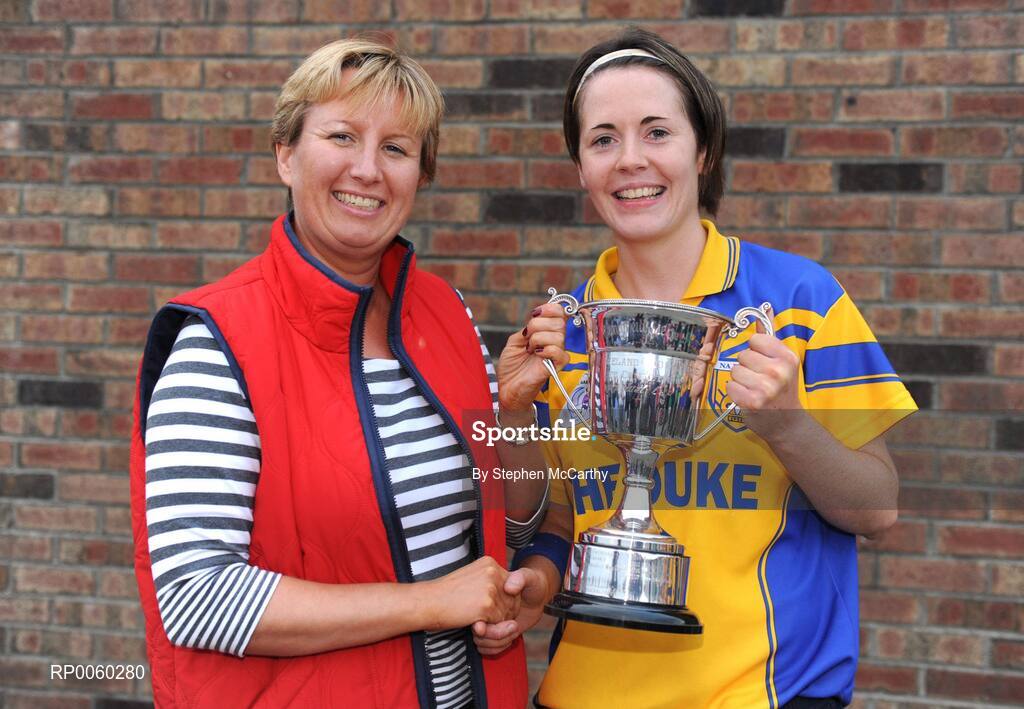 27 September 2008; Geraldine Giles, Uachtaran Cumman Peil Gael na mBan, presents Nadine Doherty, Na Finna, Dublin, with the Senior Shield Championship trophy. All-Ireland Ladies Football 7's, Naomh Mearnog, Portmarnock, Dublin. Picture credit: Stephen McCarthy / SPORTSFILE