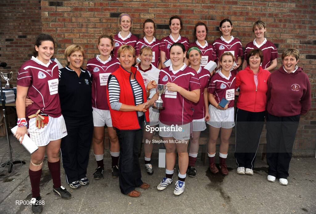 27 September 2008; Geraldine Giles, Uachtaran Cumman Peil Gael na mBan, presents the cup to captain Lynda Waters after St. Martins, Wexford, won the Junior Championship. All-Ireland Ladies Football 7's, Naomh Mearnog, Portmarnock, Dublin. Picture credit: Stephen McCarthy / SPORTSFILE