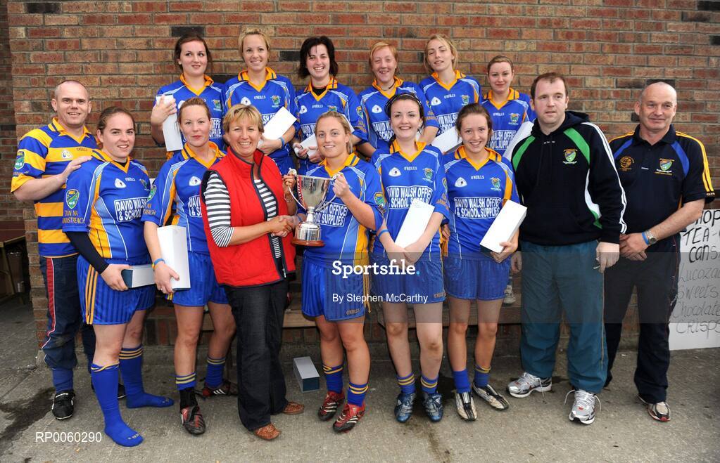 27 September 2008; Geraldine Giles, Uachtaran Cumman Peil Gael na mBan, presents the cup to captain Aoife McGovern after Abbeyside, Waterford, won the Junior Championship. All-Ireland Ladies Football 7's, Naomh Mearnog, Portmarnock, Dublin. Picture credit: Stephen McCarthy / SPORTSFILE