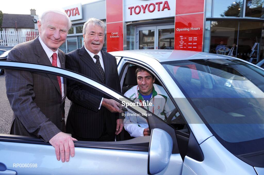30 September 2008; The Olympic Council of Ireland in association with the Carroll and Kinsella Motor Group presented a Toyota Corolla car to boxer Kenny Egan in recognition of his silver medal performance at the Beijing Olympics. Making the presentation at Carroll and Kinsella’s Showroom in Walkinstown, Fonsie Carroll of Carroll and Kinsella’s, congratulated Kenny on his superb efforts and wished him many miles of happy motoring. Pictured with Kenny are, Pat Hickey, left, President of the Olympic Council of Ireland and Fonsie Carroll, Director of Carroll & Kinsella. Carroll & Kinsella Showrooms, Walkinstown, Co. Dublin. Picture credit: Brendan Moran / SPORTSFILE
