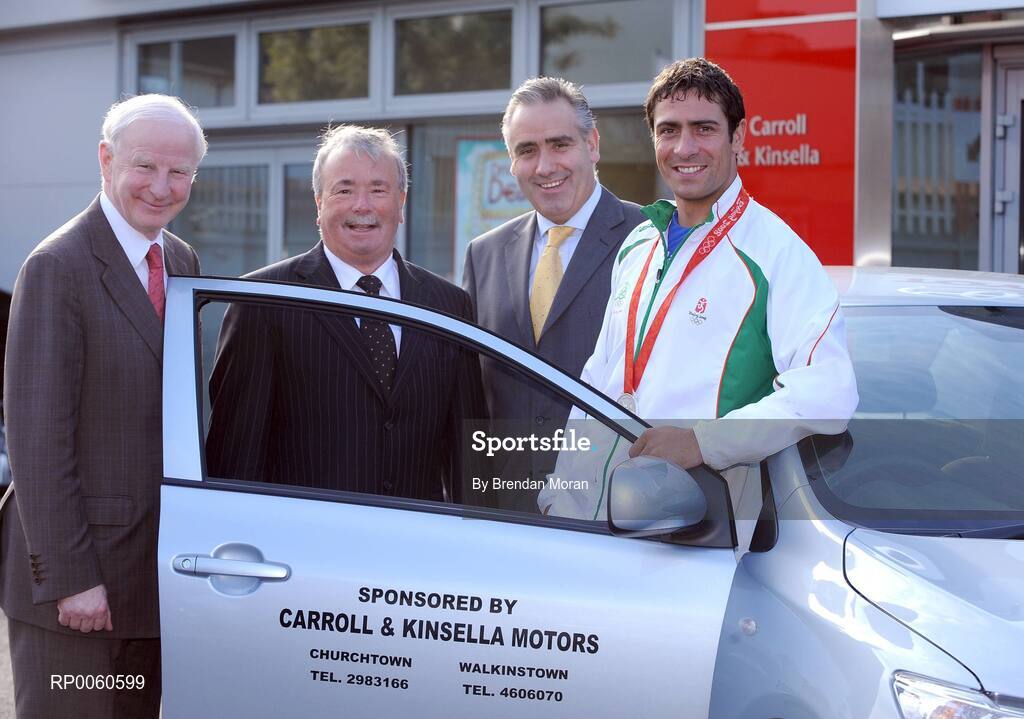 30 September 2008; The Olympic Council of Ireland in association with the Carroll and Kinsella Motor Group presented a Toyota Corolla car to boxer Kenny Egan in recognition of his silver medal performance at the Beijing Olympics. Making the presentation at Carroll and Kinsella’s Showroom in Walkinstown, Fonsie Carroll of Carroll and Kinsella’s, congratulated Kenny on his superb efforts and wished him many miles of happy motoring. Pictured with Kenny are, Pat Hickey, left, President of the Olympic Council of Ireland, Fonsie Carroll, centre, and Loughlin Murphy, Directors of Carroll & Kinsella, Walkinstown and Churchtown. Carroll & Kinsella Showrooms, Walkinstown, Co. Dublin. Picture credit: Brendan Moran / SPORTSFILE