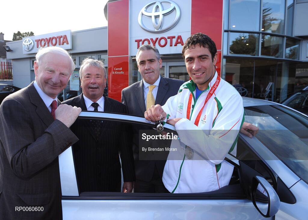 16 October 2008; The Olympic Council of Ireland in association with the Carroll and Kinsella Motor Group presented a Toyota Corolla car to boxer Kenny Egan in recognition of his silver medal performance at the Beijing Olympics. Making the presentation at Carroll and Kinsella’s Showroom in Walkinstown, Fonsie Carroll of Carroll and Kinsella’s, congratulated Kenny on his superb efforts and wished him many miles of happy motoring. Pictured with Kenny are, Pat Hickey, left, President of the Olympic Council of Ireland, Fonsie Carroll, centre, and Loughlin Murphy, Directors of Carroll & Kinsella, Walkinstown and Churchtown. Carroll & Kinsella Showrooms, Walkinstown, Co. Dublin. Picture credit: Brendan Moran / SPORTSFILE