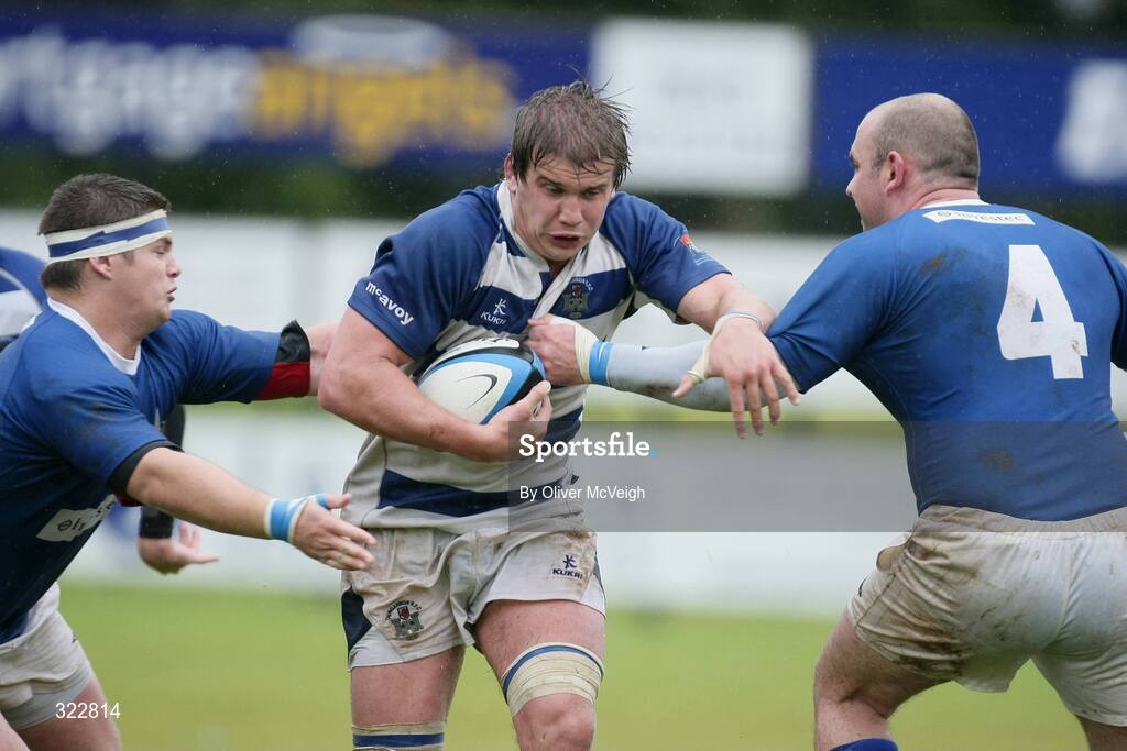 4 October 2008; Thomas Anderson, Dungannon, in action against Ruaidhri Murphy and Gareth Logan, St. Mary's College. AIB League Division 1, Dungannon v St Mary's College, Stevenson Park, Dungannon, Co. Tyrone. Picture credit: Oliver McVeigh / SPORTSFILE