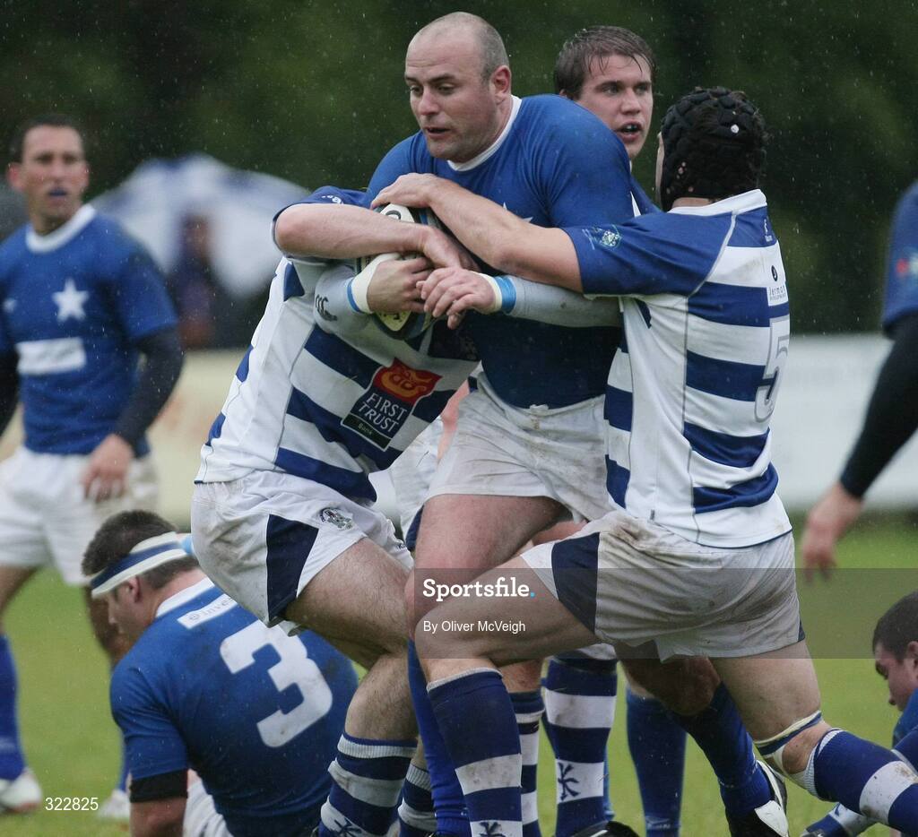 4 ctober 2008; Gareth Logan, St. Mary's College, in action against Nevile Magee and Michael Rainey, Dungannon. AIB League Division 1, Dungannon v St Mary's College, Stevenson Park, Dungannon, Co. Tyrone. Picture credit: Oliver McVeigh / SPORTSFILE