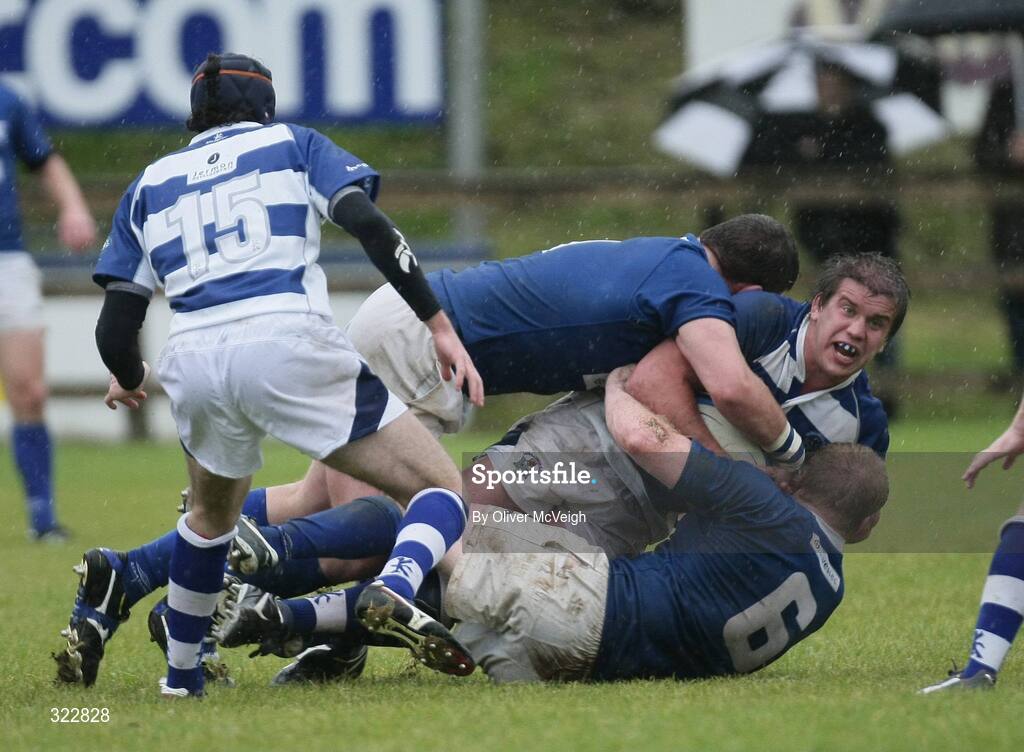 4 October 2008; Thomas Anderson, Dunganno, is tackled by Rob Sweeney and Paul Nash, St. Mary's College. AIB League Division 1, Dungannon v St Mary's College, Stevenson Park, Dungannon, Co. Tyrone. Picture credit: Oliver McVeigh / SPORTSFILE