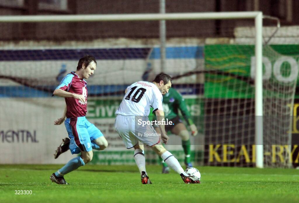 10 October 2008; Bohemians' Jason Byrne shoots to score his side's first goal despite the attempts of Drogheda United's Joe Kendrick. eircom League Premier Division, Drogheda United v Bohemians, United Park, Drogheda. Photo by Sportsfile