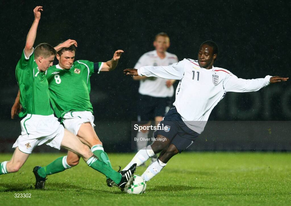 10 October 2008; Victor Moses, England, in action against Eunan O'Kane and Corry Evans, Northern Ireland. UEFA Under 19 European Championships Qualifying Round, Northern Ireland v England, Windsor Park, Belfast. Picture credit: Oliver McVeigh / SPORTSFILE