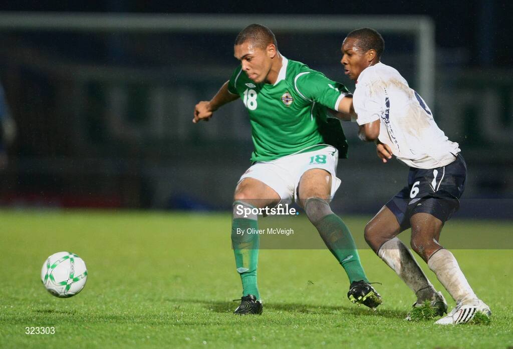 10 October 2008; Josh Magennis, Northern Ireland, in action against Gavin Hoyte, England. UEFA Under 19 European Championships Qualifying Round, Northern Ireland v England, Windsor Park, Belfast. Picture credit: Oliver McVeigh / SPORTSFILE