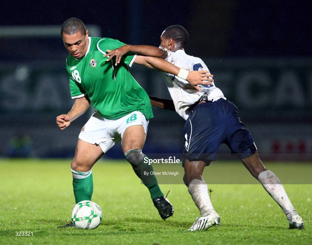 10 October 2008; Josh Magennis, Northern Ireland, in action against Gavin Hoyte, England. UEFA Under 19 European Championships Qualifying Round, Northern Ireland v England, Windsor Park, Belfast. Picture credit: Oliver McVeigh / SPORTSFILE