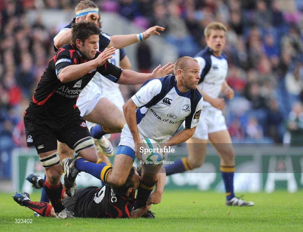 11 October 2008; Chris Whitaker, Leinster, is tackled by Mike Blair and Alister Hogg, Edinburgh. Heineken Cup, Pool 2, Round 1, Edinburgh v Leinster, Murrayfield, Edinburgh, Scotland. Picture credit: Brendan Moran / SPORTSFILE