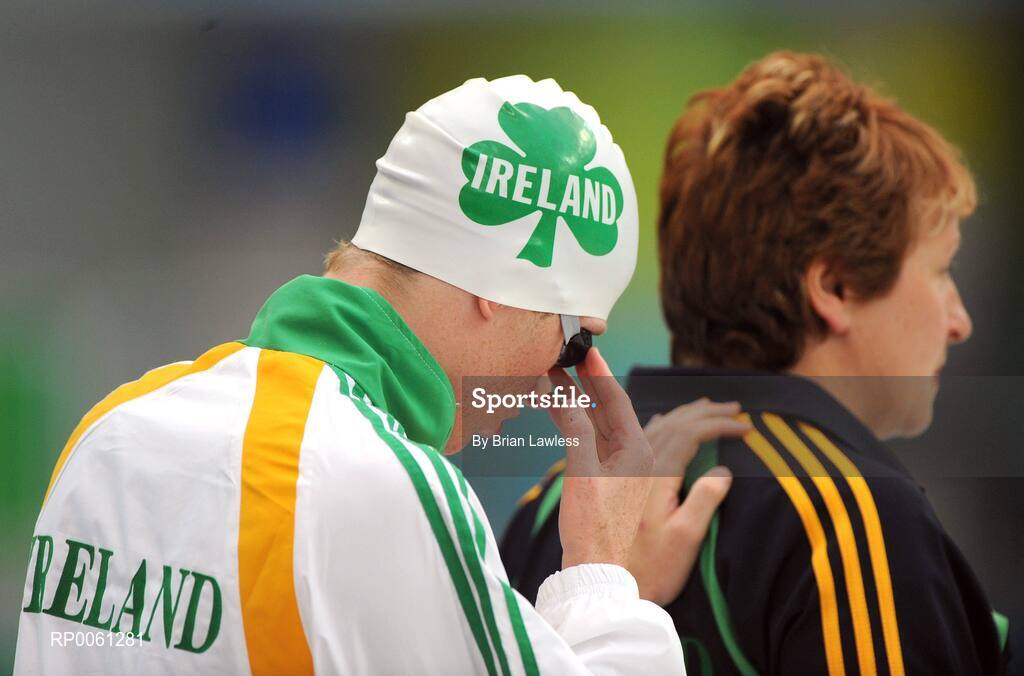 12 September 2008; Ireland's Stephen Campbell, from Cookstown, Tyrone, is lead out by Swimming manager Geraldine Conway for the Men's 100m Freestyle - S11. Campbell finished his heat in a time of 1:08.08 missing out on qualification for the final. Beijing Paralympic Games 2008, Men's 100m Freestyle - S11, Heat 3, National Aquatic Centre, Olympic Green, Beijing, China. Picture credit: Brian Lawless / SPORTSFILE