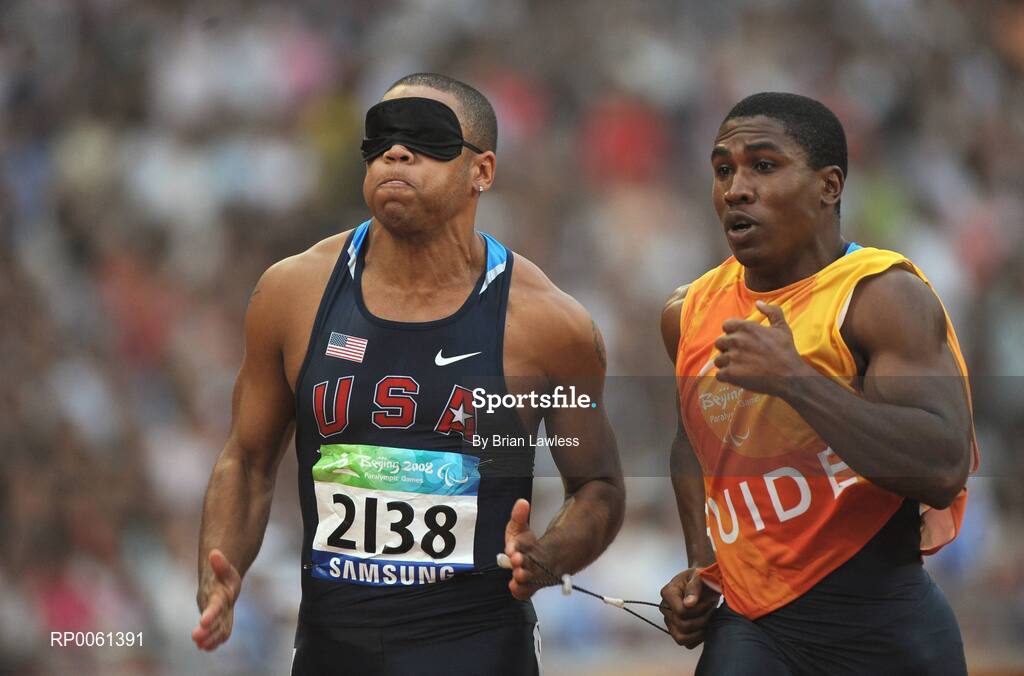8 September 2008; USA's Nelacey Porter and his guide in action during the Men's 100m - T11. Beijing Paralympic Games 2008, National Stadium, Olympic Green, Beijing, China. Picture credit: Brian Lawless / SPORTSFILE