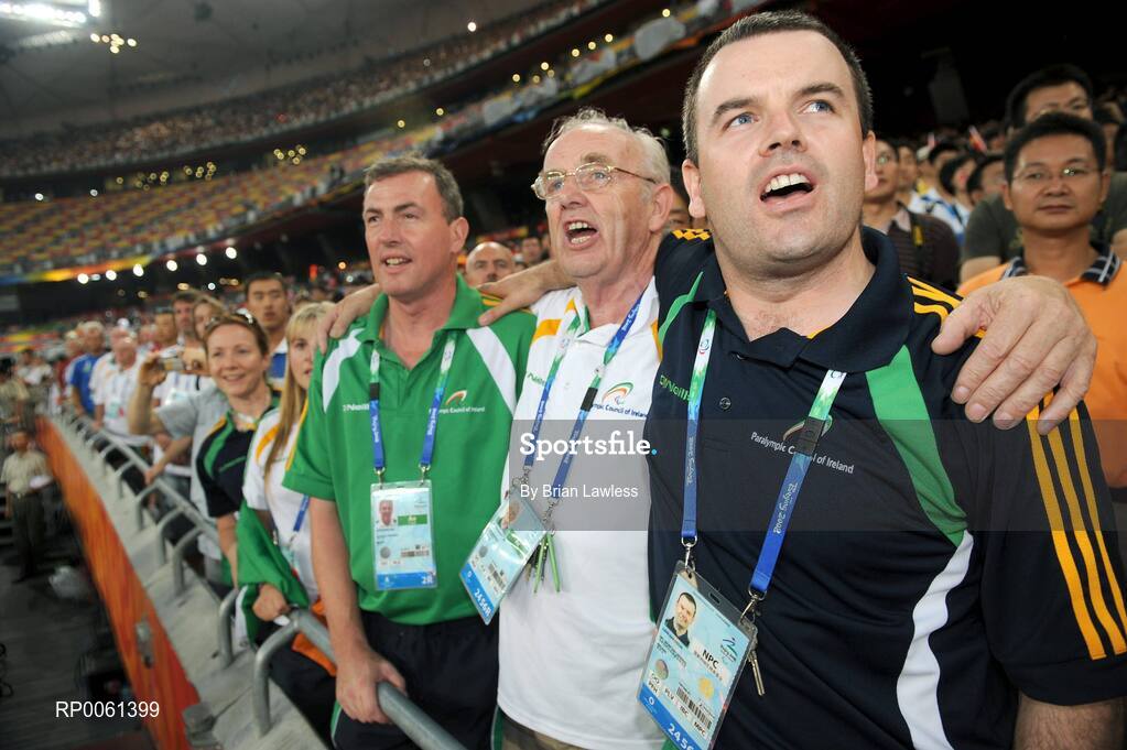 13 September 2008; Paralympic Performance Director Liam Harbison, right, Chef de Mission Jimmy Byrne, centre, and Team Sports Psychologist Alan Ringland, after Ireland's Jason Smyth, from Eglington, Co. Derry, won the Men's 100m T13 Final to win Gold and set a new world and paralympic record in a time of 10.62, beating his own world record of 10.81 which he set in this mornings heats. Beijing Paralympic Games 2008, Men's 100m T13 Final, National Stadium, Olympic Green, Beijing, China. Picture credit: Brian Lawless /  SPORTSFILE