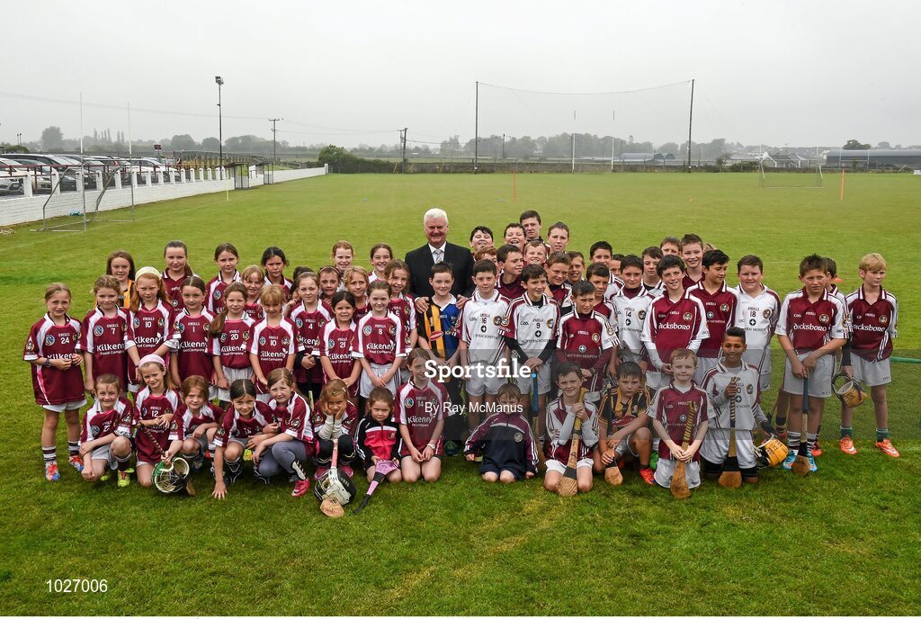 14 July 2015; Uachtarán Chumann Lúthchleas Gael Aogán Ó Fearghail  with girls and boys from the host Dicksboro GAA Club at the launch of the GAA Hurling All-Ireland Senior Championship Series 2015. Dicksboro GAA Club, Kilkenny. Picture credit: Ray McManus / SPORTSFILE