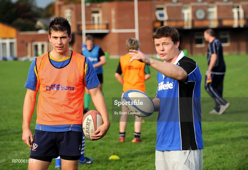 12 October 2008; RAZOR SHARP SKILLS: Irish rugby legend Brian O’Driscoll pulled on his Gillette jersey as he hosted the 2008 Gillette Fusion Rugby Coaching Clinic at Wanderers Rugby Club. The Clinic saw 45 lucky participants gather from all parts of the country to take part in an exclusive days’ coaching with the Irish Rugby Captain and Leinster star along with top Leinster coaches. To see all the action and top tips log on to www.gillettechampions.ie. At the clinic is James Henly, from Bangor, Co. Down with Brian O'Driscoll. Wanderers Rugby Club, Merrion Road, Ballsbridge, Dublin. Picture credit: Brian Lawless / SPORTSFILE