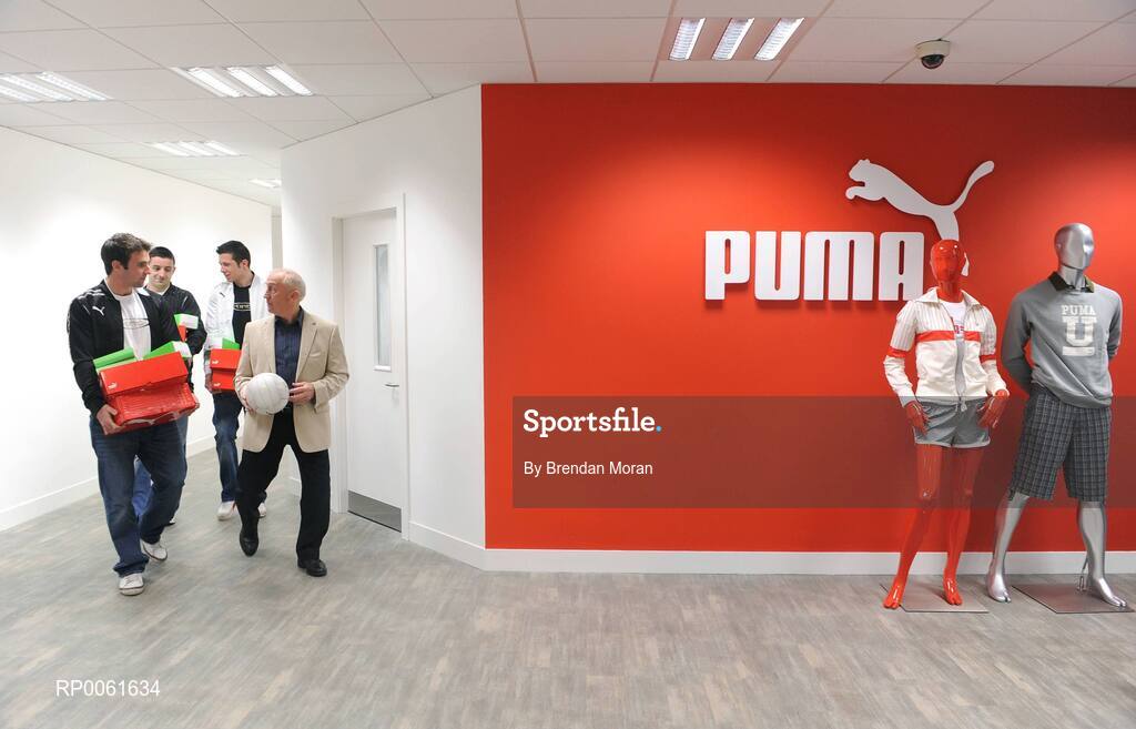 15 October 2008; The world's fastest growing sports-lifestyle brand, PUMA, has unveiled it's football boot and bodywear sponsorship of the Ireland Combined Rules team who travel to Australia this weekend for two Test matches against the hosts in Perth and Melbourne. Pictured carrying some of the gear for the team are, from left, Bryan Cullen of Dublin, Aidan O'Mahony of Kerry, Sean Cavanagh of Tyrone, and team manager Sean Boylan. Picture credit: Brendan Moran / SPORTSFILE