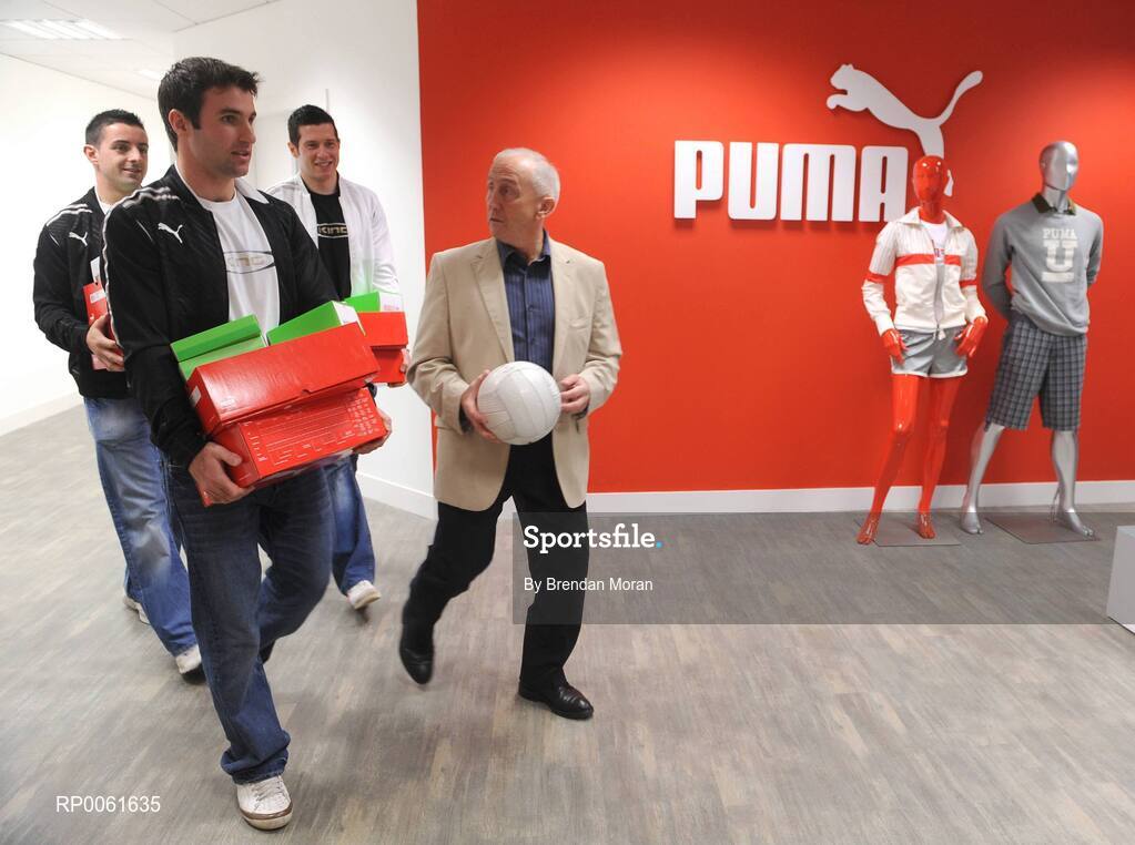 15 October 2008; The world's fastest growing sports-lifestyle brand, PUMA, has unveiled it's football boot and bodywear sponsorship of the Ireland Combined Rules team who travel to Australia this weekend for two Test matches against the hosts in Perth and Melbourne. Pictured carrying some of the gear for the team are, from left, Bryan Cullen of Dublin, Aidan O'Mahony of Kerry, Sean Cavanagh of Tyrone, and team manager Sean Boylan. Picture credit: Brendan Moran / SPORTSFILE