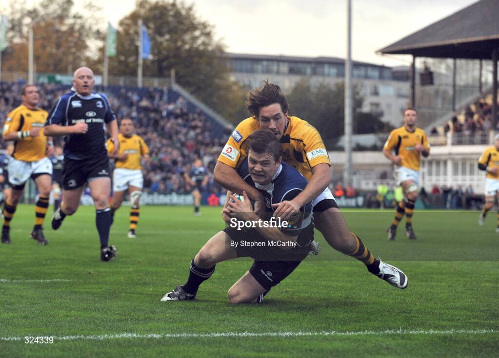 18 October 2008; Brian O'Driscoll, Leinster, goes over for his and his side's second try despite the attention of Tom Voyce, London Wasps. Heineken Cup, Pool 2 Round 2, Leinster v London Wasps, RDS, Dublin. Picture credit: Stephen McCarthy / SPORTSFILE