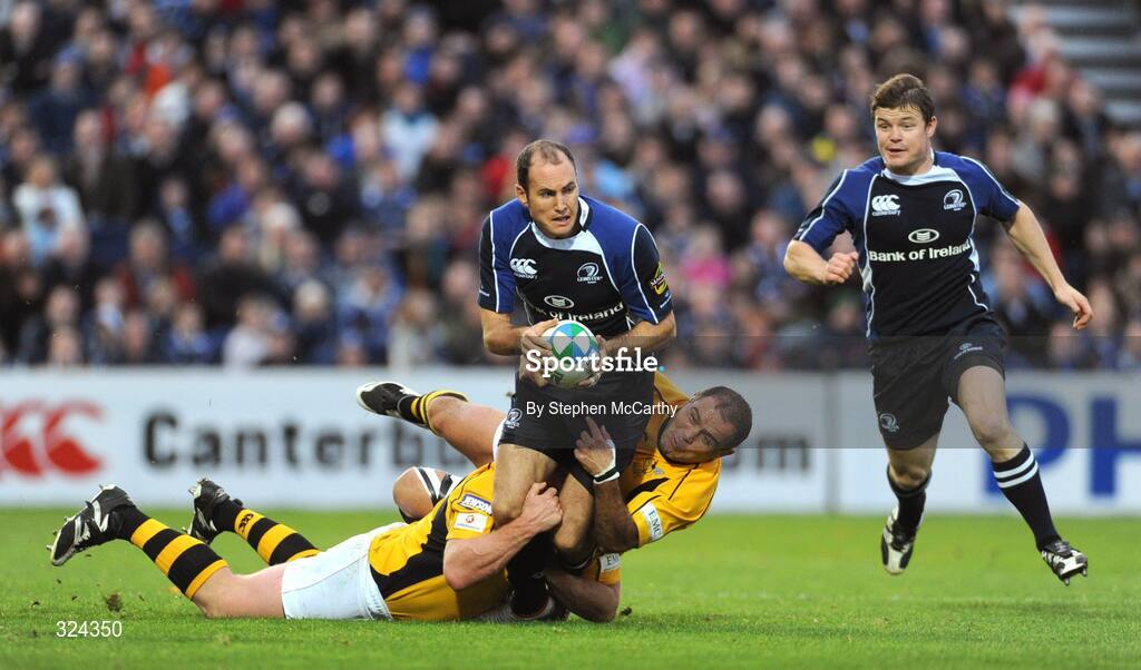 18 October 2008; Girvan Dempsey, Leinster, supporteed by Brian O'Driscoll is tackled by Tim Payne and Raphael Ibanez, right, London Wasps. Heineken Cup, Pool 2 Round 2, Leinster v London Wasps, RDS, Dublin. Picture credit: Stephen McCarthy / SPORTSFILE