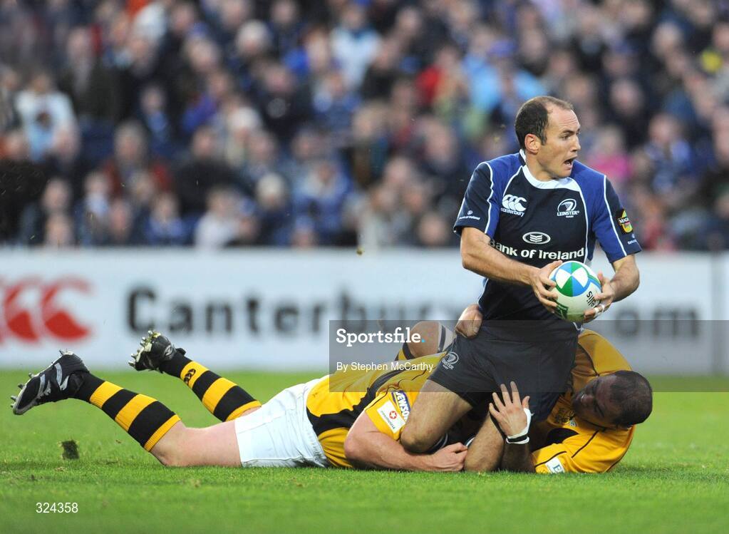 18 October 2008; Girvan Dempsey, Leinster, is tackled by Tim Payne and Raphael Ibanez, right, London Wasps. Heineken Cup, Pool 2 Round 2, Leinster v London Wasps, RDS, Dublin. Picture credit: Stephen McCarthy / SPORTSFILE