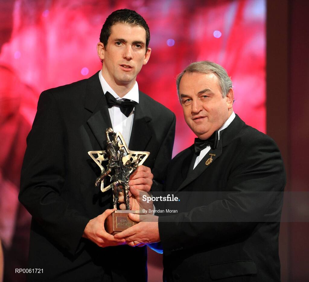 17 October 2008; Justin McMahon of Tyrone is presented with his GAA All-Star award by Nickey Brennan, GAA President, during the 2008 GAA All-Stars sponsored by Vodafone. Citywest Hotel, Conference, Leisure & Golf Resort, Dublin. Picture credit: Brendan Moran / SPORTSFILE