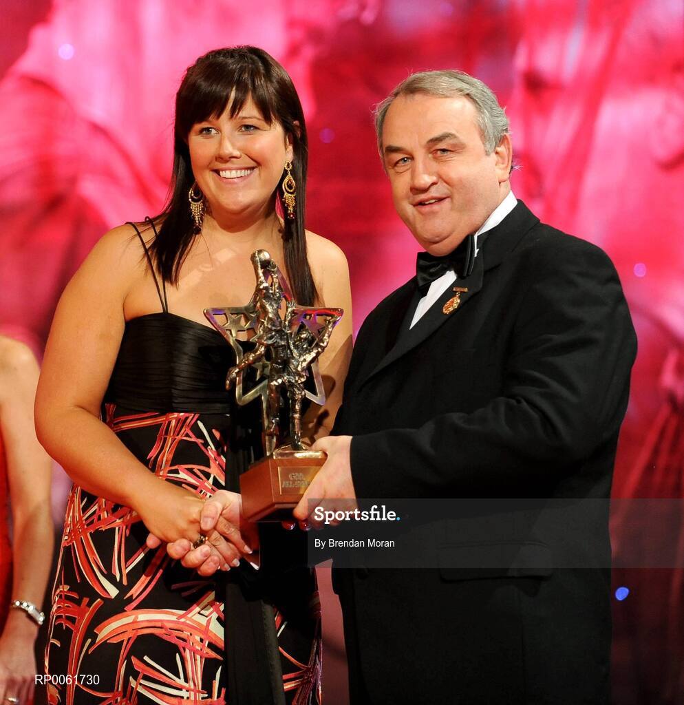 17 October 2008; Sinead Clarke on behalf of Ronan Clarke, Armagh, receives his GAA All-Star award from Nickey Brennan, GAA President, during the 2008 GAA All-Stars sponsored by Vodafone. Citywest Hotel, Conference, Leisure & Golf Resort, Dublin. Picture credit: Brendan Moran / SPORTSFILE