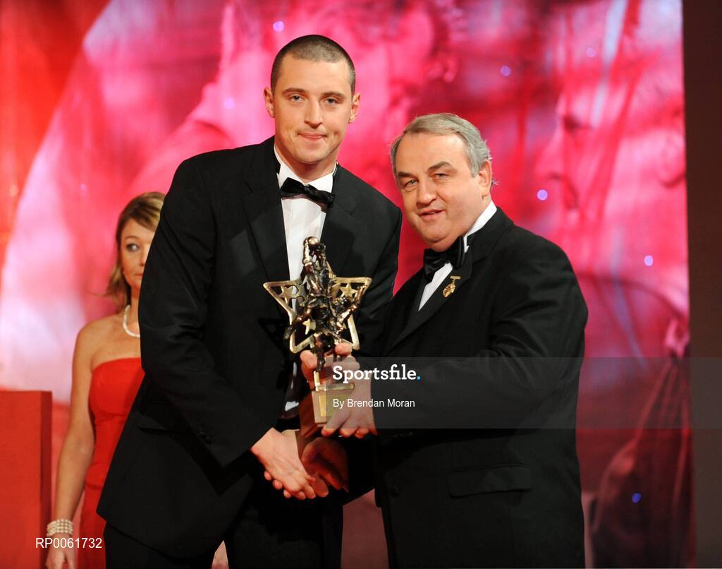 17 October 2008; Kieran Donaghy of Kerry is presented with his GAA All-Star award by Nickey Brennan, GAA President, during the 2008 GAA All-Stars sponsored by Vodafone. Citywest Hotel, Conference, Leisure & Golf Resort, Dublin. Picture credit: Brendan Moran / SPORTSFILE