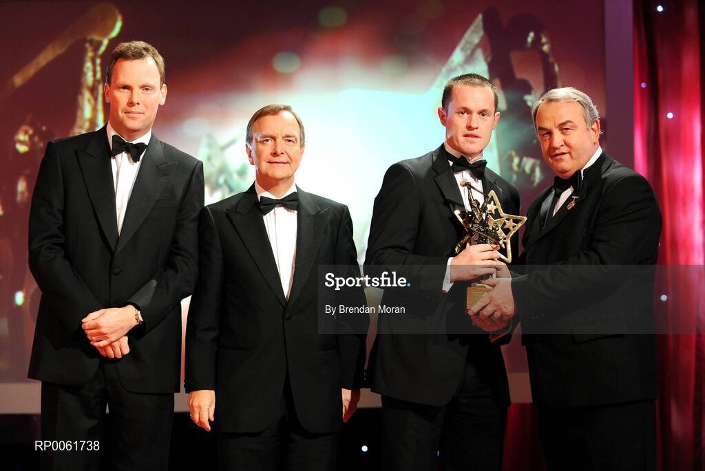 17 October 2008; Michael Kavanagh of Kilkenny is presented with his GAA All-Star award by Nickey Brennan, GAA President, in the company of Minister for Arts, Sport and Tourism, Martin Cullen T.D., and Charles Butterworth, CEO Vodafone Ireland, right, during the 2008 GAA All-Stars sponsored by Vodafone. Citywest Hotel, Conference, Leisure & Golf Resort, Dublin. Picture credit: Brendan Moran / SPORTSFILE