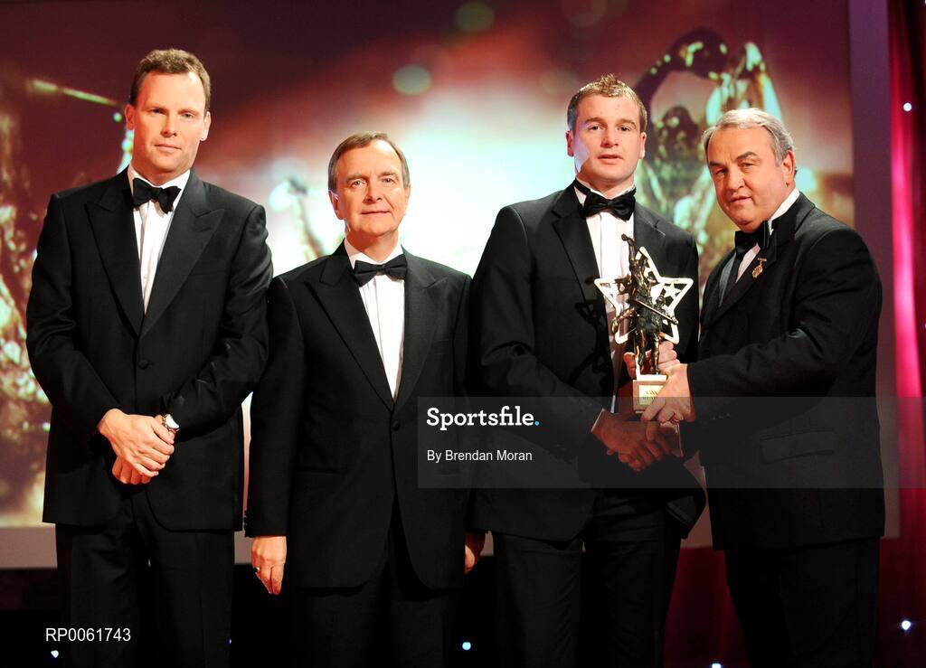 17 October 2008; JJ Delaney of Kilkenny is presented with his GAA All-Star award by Nickey Brennan, GAA President, in the company of Minister for Arts, Sport and Tourism, Martin Cullen T.D., and Charles Butterworth, CEO Vodafone Ireland, left, during the 2008 GAA All-Stars sponsored by Vodafone. Citywest Hotel, Conference, Leisure & Golf Resort, Dublin. Picture credit: Brendan Moran / SPORTSFILE