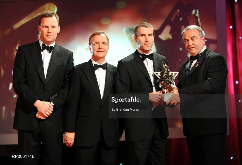 17 October 2008; Ben O'Connor of Cork is presented with his GAA All-Star award by Nickey Brennan, GAA President, in the company of Minister for Arts, Sport and Tourism, Martin Cullen T.D., and Charles Butterworth, CEO Vodafone Ireland, left, during the 2008 GAA All-Stars sponsored by Vodafone. Citywest Hotel, Conference, Leisure & Golf Resort, Dublin. Picture credit: Brendan Moran / SPORTSFILE